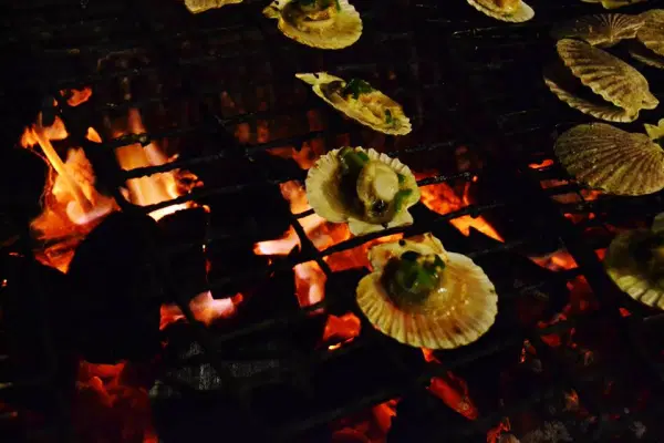 Grilling some scallops.