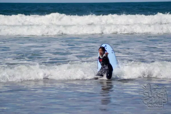 Nose-diving into a wave.